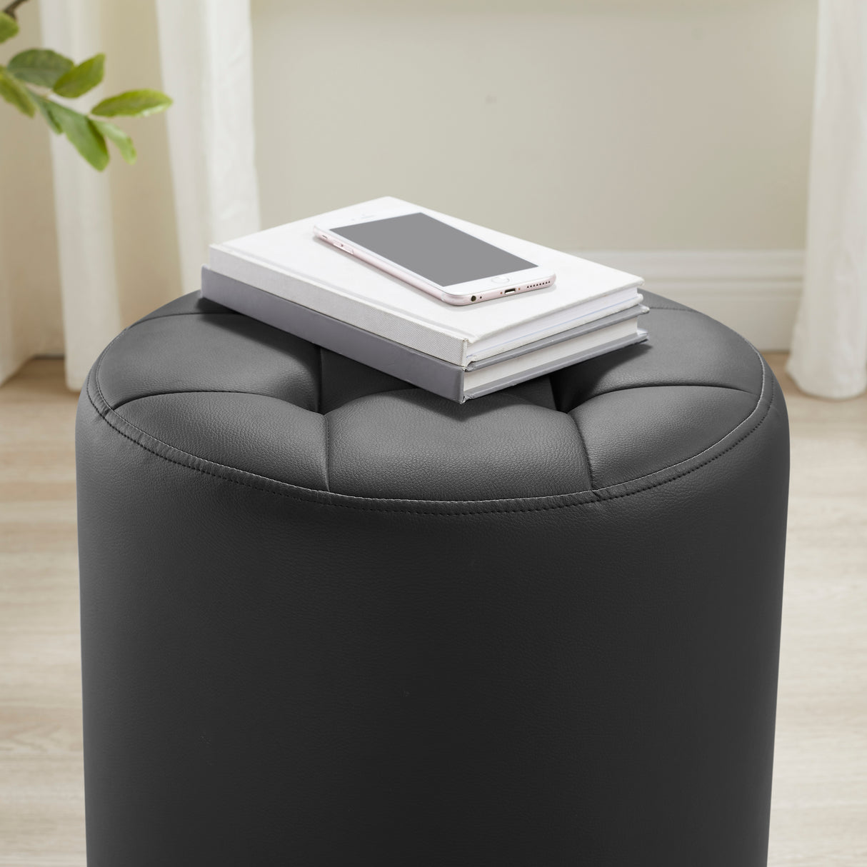 Saylor Black Swivel Ottoman