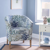 Three quarter front view armchair fabric blue ocean coral pattern wooden legs styled living room